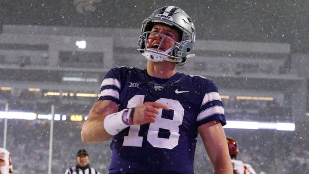 Nov 25, 2023; Manhattan, Kansas, USA; Kansas State Wildcats quarterback Will Howard (18) celebrates a touchdown in the third quarter against the Iowa State Cyclones at Bill Snyder Family Football Stadium. Mandatory Credit: Scott Sewell-USA TODAY Sports